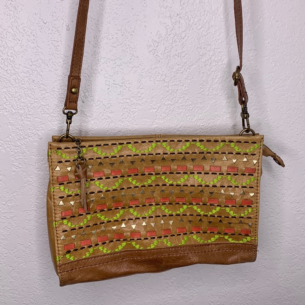 The SAK tan leather embroidered crossbody purse handbag